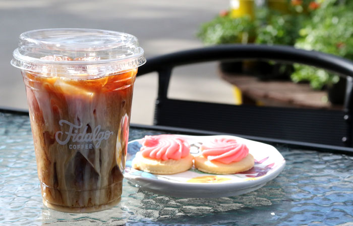 Sky iced coffee and signature pink cookies